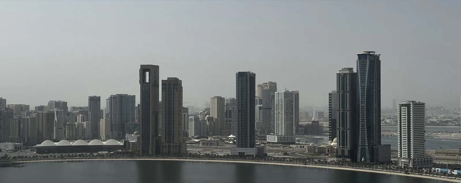 Residential towers along the shore of Al Khan Lagoon in Sharjah
