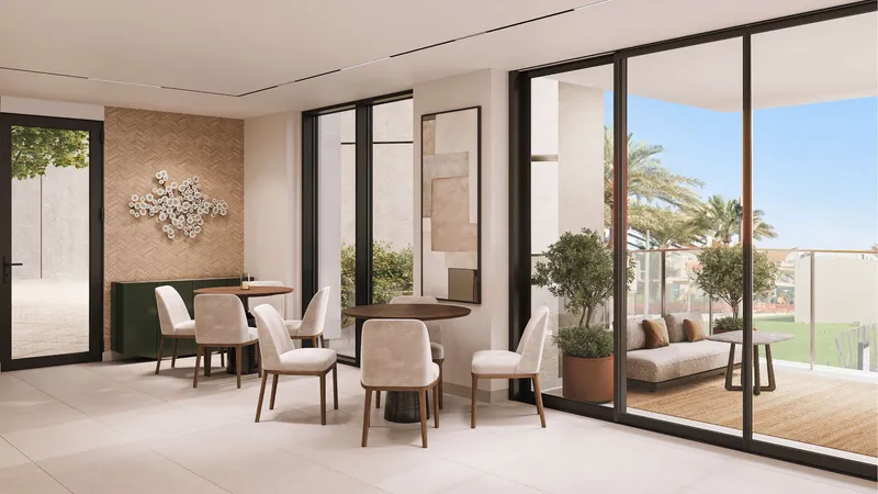 Render of a residents’ function room at Sidr Residences opening onto a terrace