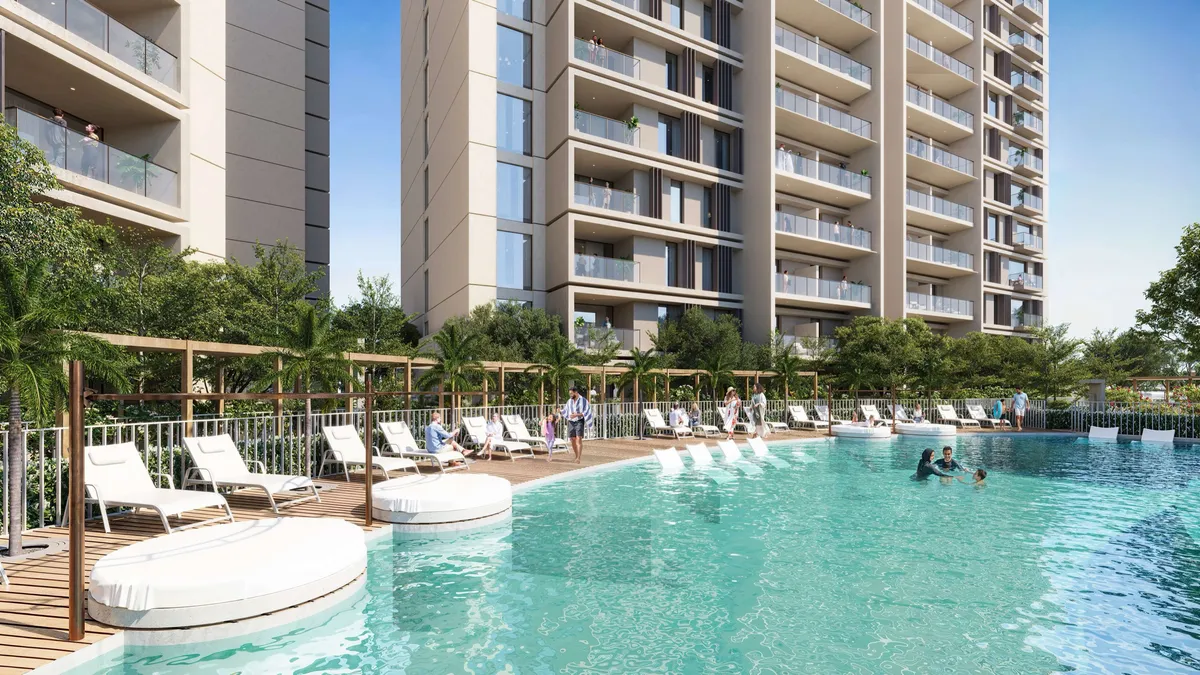 Render of the swimming pool and loungers between the Sidr Residences towers