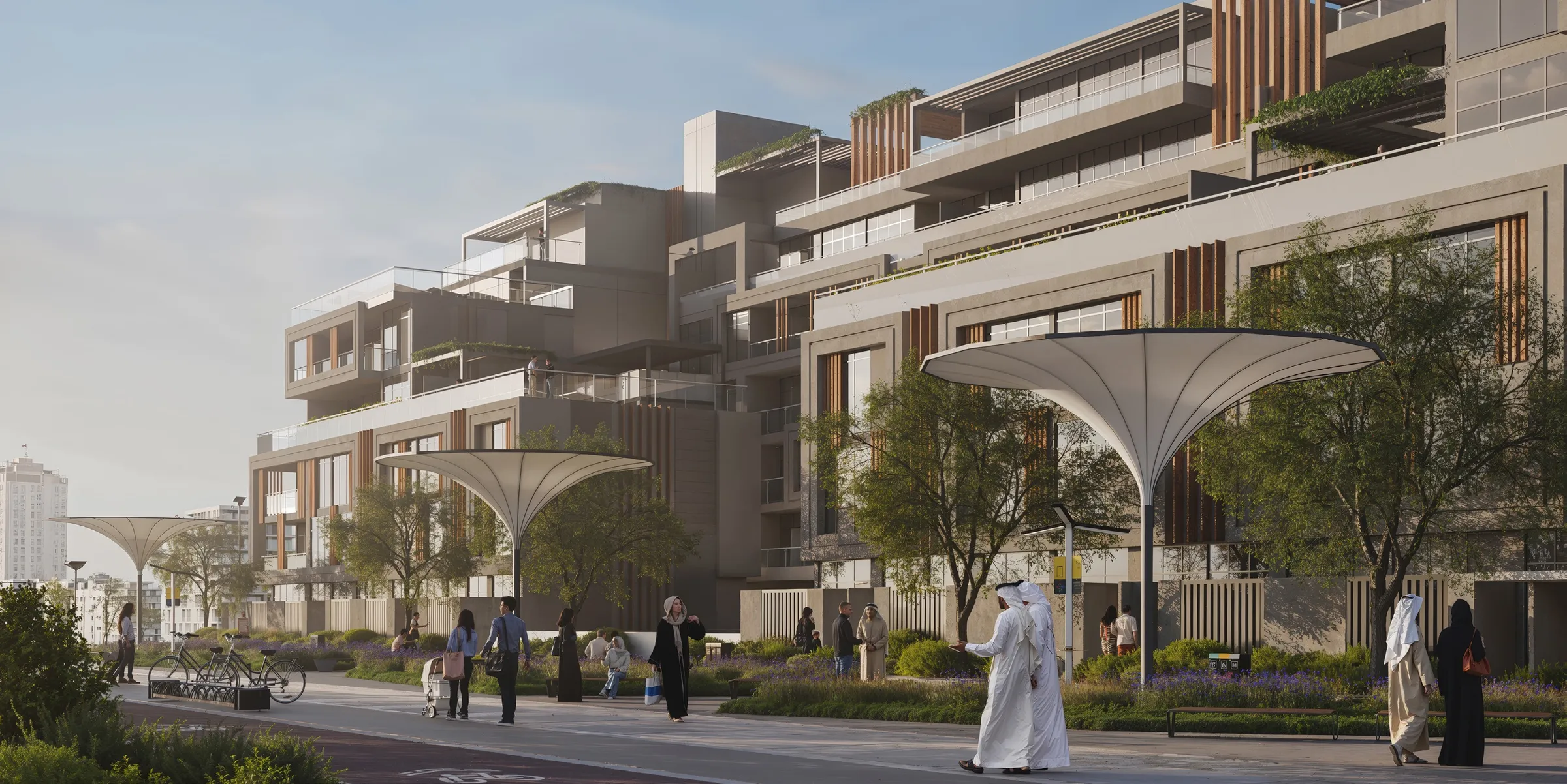Sila residential building in Masdar City, Abu Dhabi, with shaded canopies along a landscaped street (developer render)