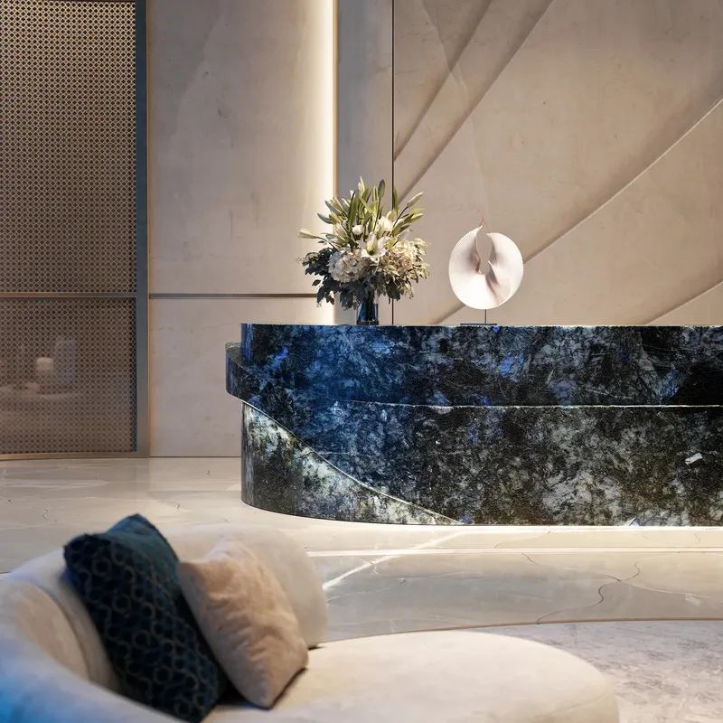 Render of the lobby reception desk at Silena in blue stone