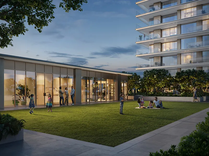 Render of families on the lawn beside a glazed pavilion at the foot of Silva at dusk