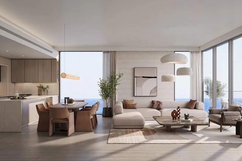 Living and dining room render in a Skai apartment by RAK Properties, with sea view