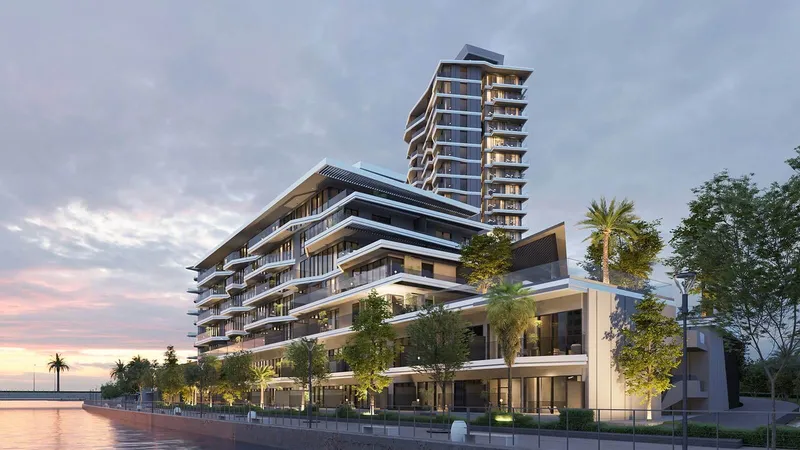 Skai by RAK Properties at dusk, with the 19-storey tower behind the lower building