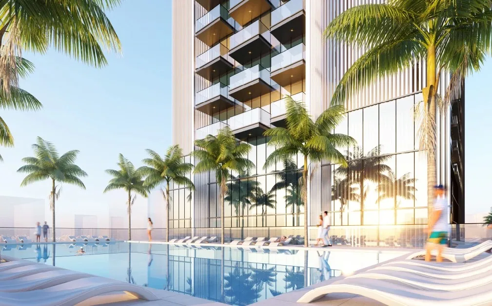 Render of the Sky Gate Tower pool deck with palms and loungers at the foot of the tower