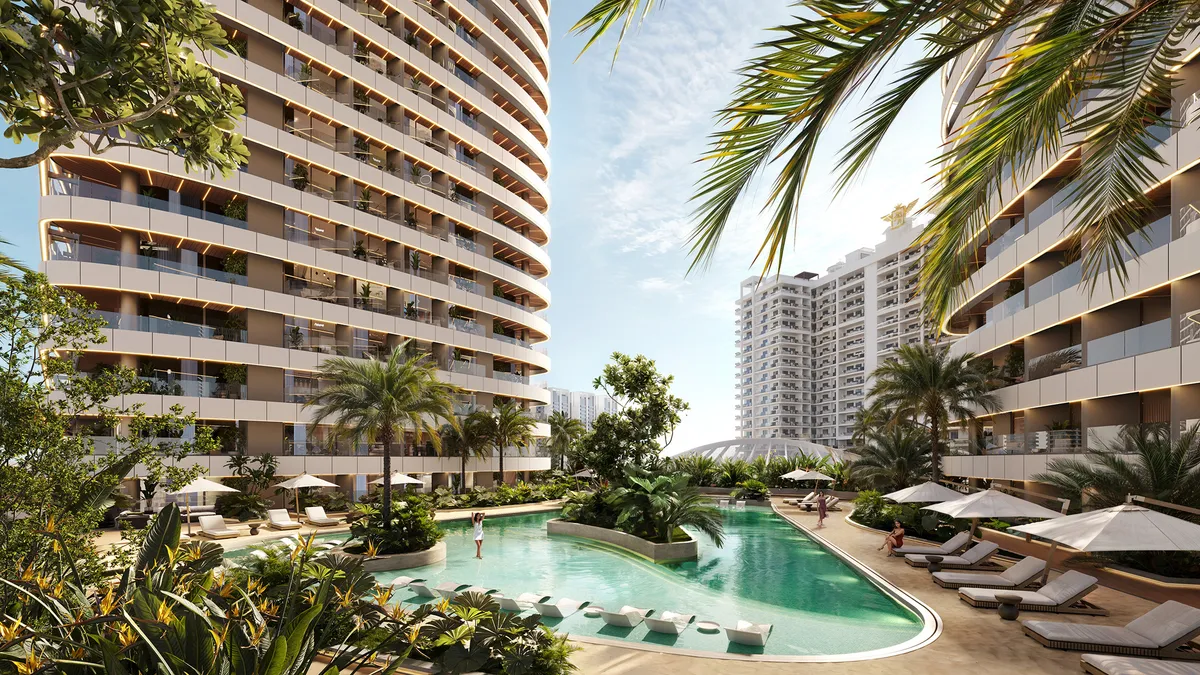 Beach-style pool with palms and sunbeds on the podium of Skyhills Astra