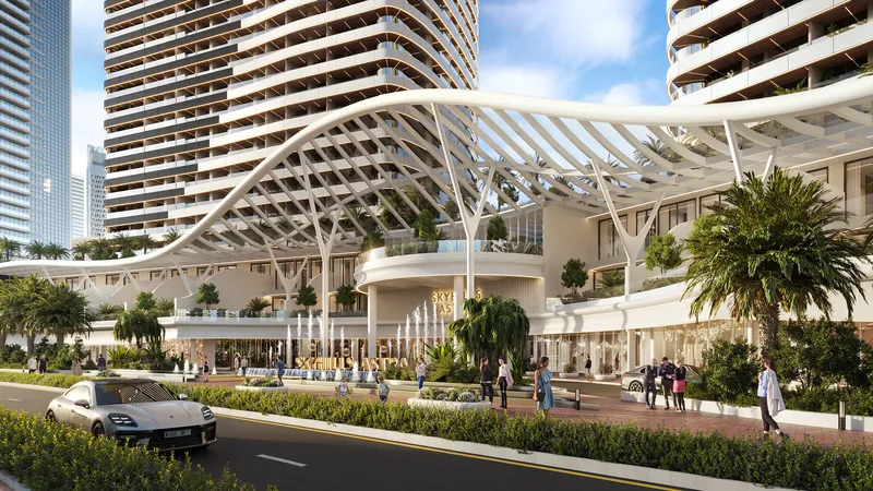 Street view of the Skyhills Astra podium with a curved white canopy over the retail and entrance level