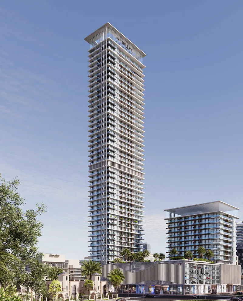 Street view of the tall Skyhills Residences 3 tower with the lower tower and retail podium beside it