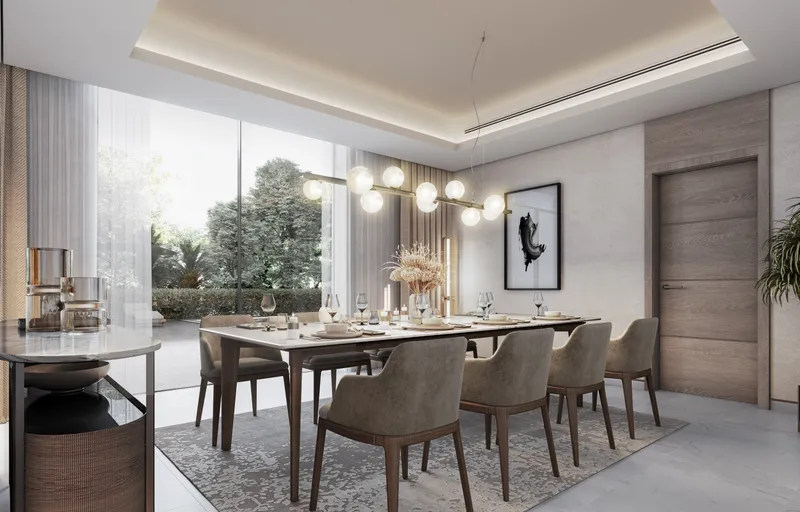 Dining room of a Sobha Elwood villa with full-height glazing