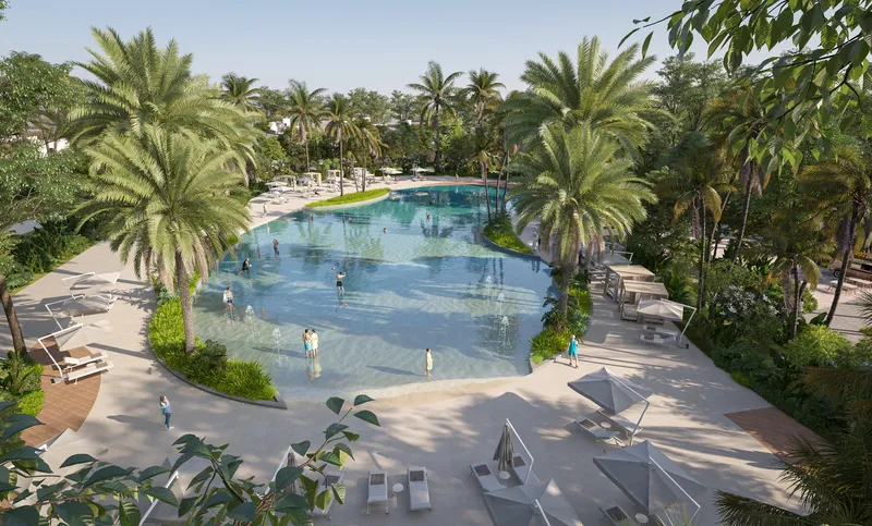 Palm-fringed swimming lagoon at Sobha Elwood