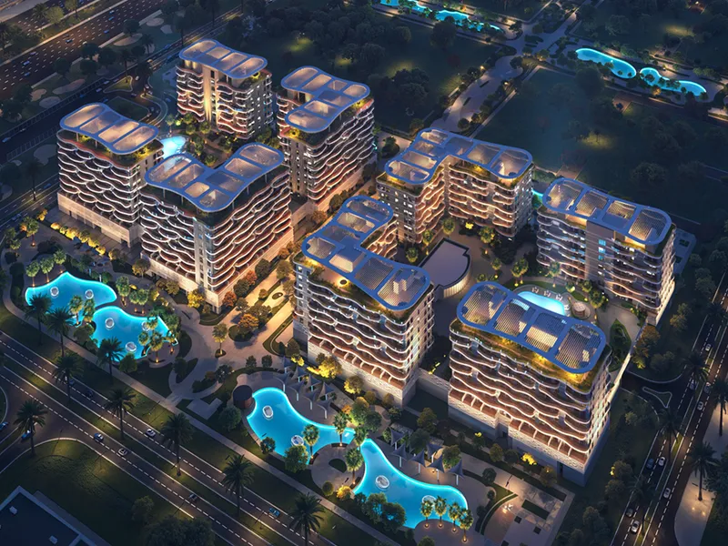 Aerial night render of the Sorrento cluster with lagoon-shaped pools between the buildings