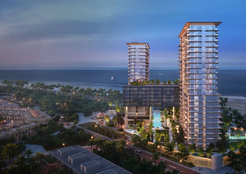 Render of the two Soto Grande towers and connecting bridge at dusk, Al Hamra, Ras Al Khaimah