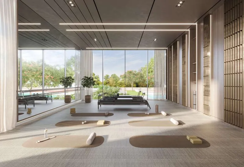 Render of the yoga studio at Soto Grande, with mats and reformers by full-height windows