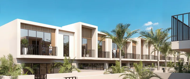 Render of a row of Sukoon homes with first-floor terraces and palm trees