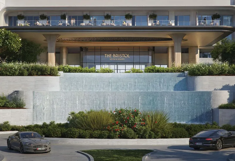 Render of the arrival court at The Bristol, with a cascading water feature and planting