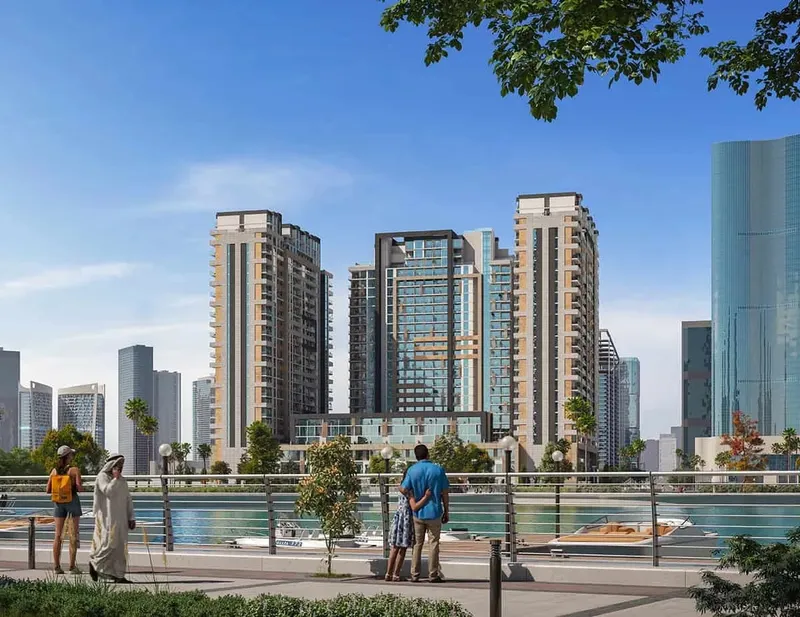 The District's three residential towers seen from a canal-side promenade on Al Reem Island, Abu Dhabi (developer render)