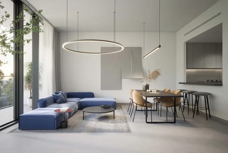 Render of an apartment living room at The Gate, Aljada, with a blue sofa, dining table, open kitchen and full-height windows
