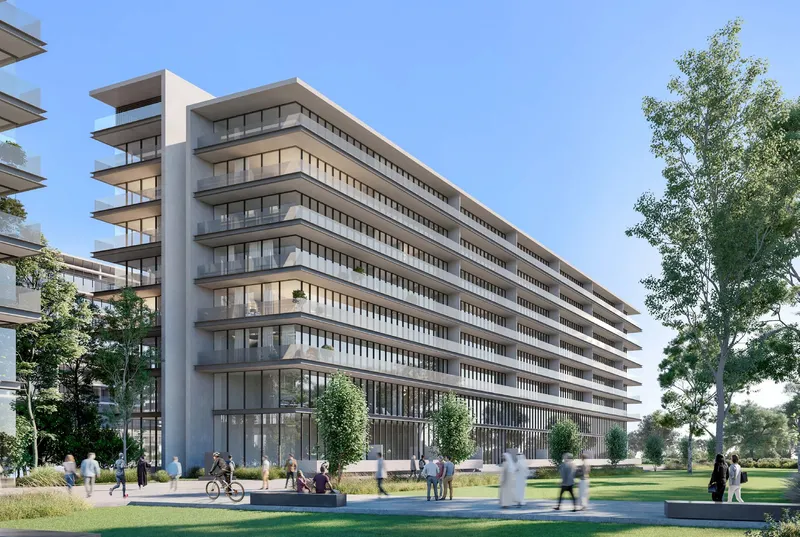 Render of a The Gate apartment building at Aljada with long horizontal balconies, seen from a landscaped park with people walking and cycling
