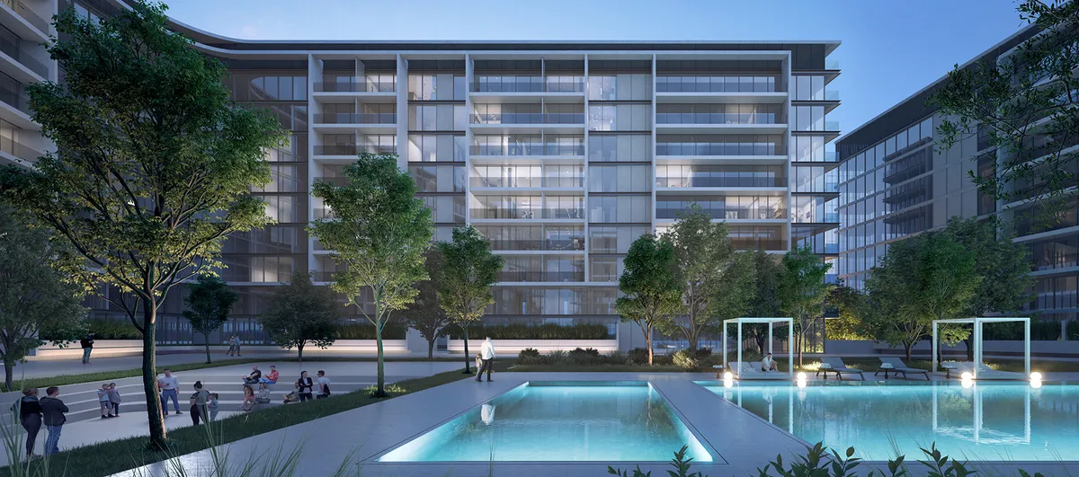 Dusk render of the swimming pool and landscaped courtyard between The Gate apartment buildings at Aljada, Sharjah
