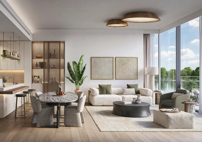Render of a living and dining room with lagoon views in a home at The Highgrove