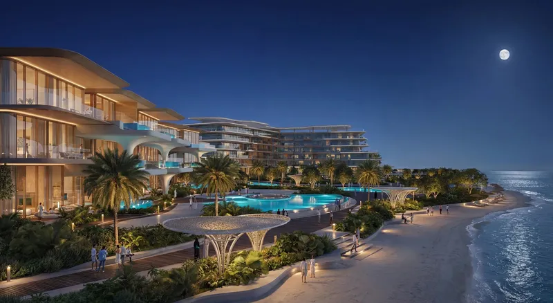 Render of The Meriva Collection by Ellington Properties seen from the beach on Dubai Islands at night