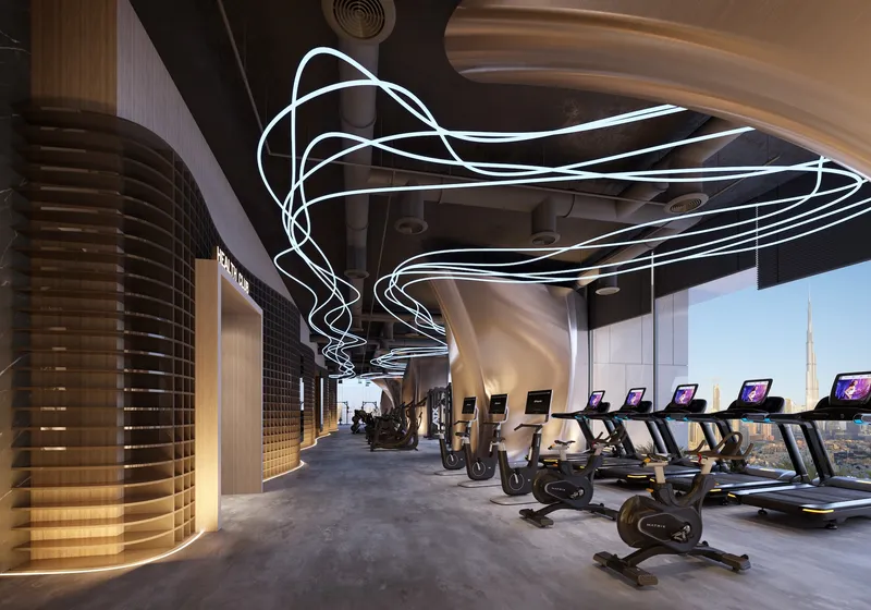 Interior render of the Tiger Sky Tower gym with cardio machines facing the skyline