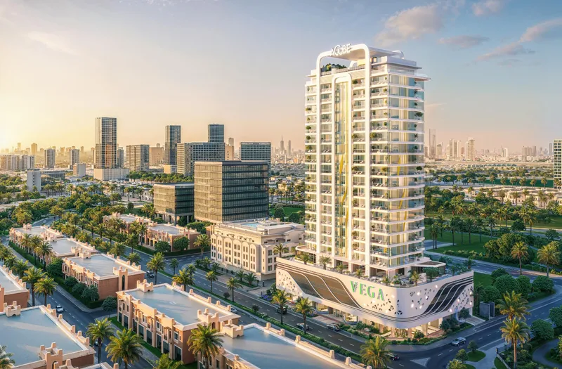 Aerial view of the Vega tower in Dubai Sports City with its curved white podium and the skyline behind