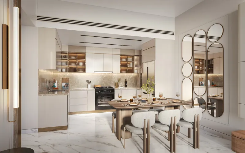 Apartment kitchen with cream cabinets, a stone splashback and a six-seat dining table