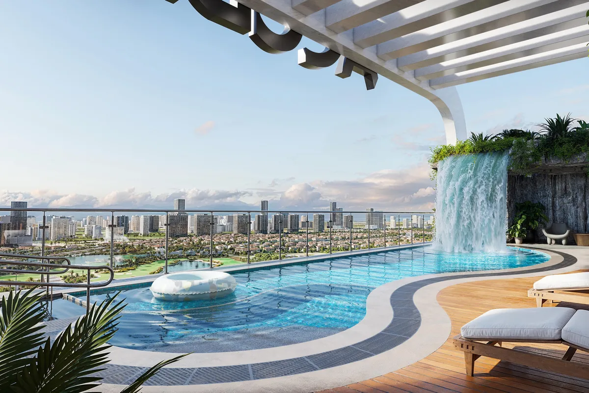 Sky pool with a waterfall feature and sun loungers overlooking Dubai Sports City