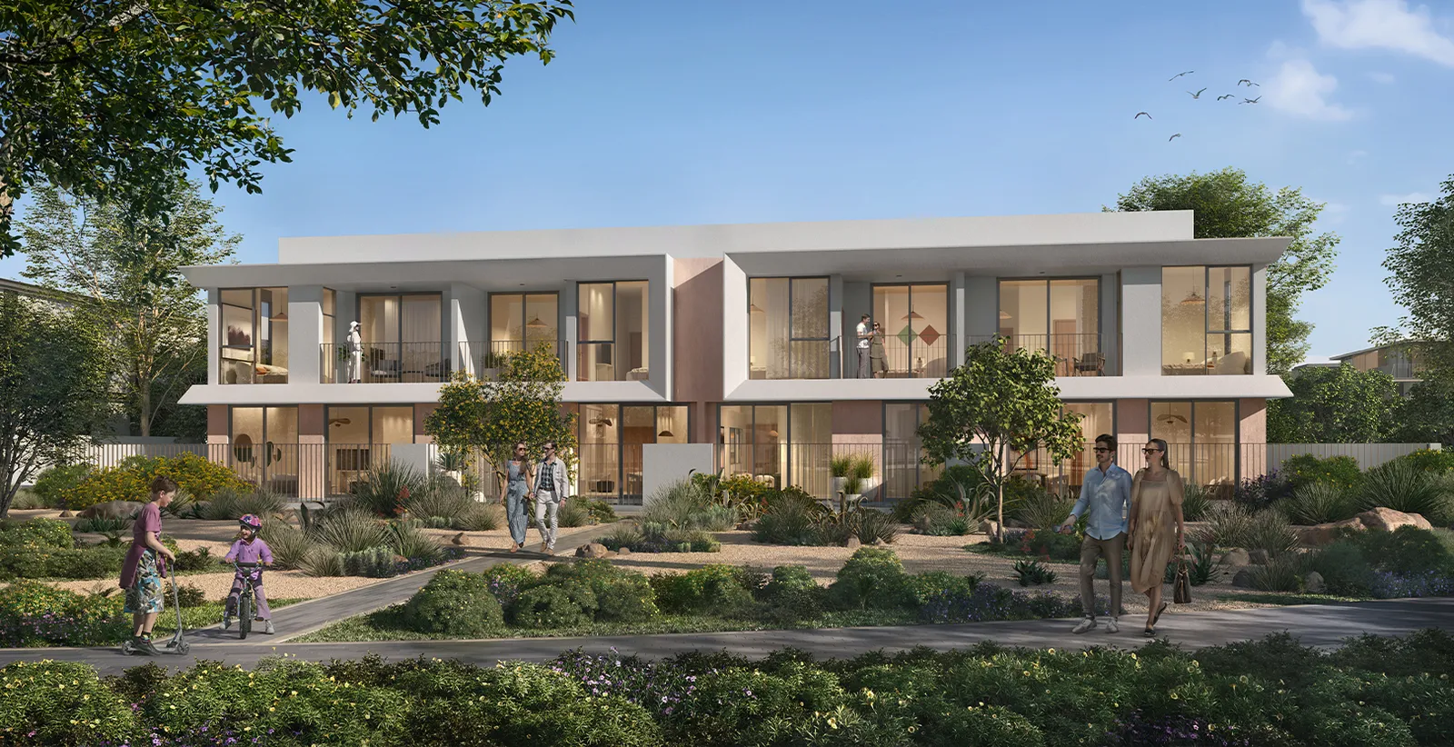 Render of a row of two-storey Velora 2 townhouses facing a landscaped garden path