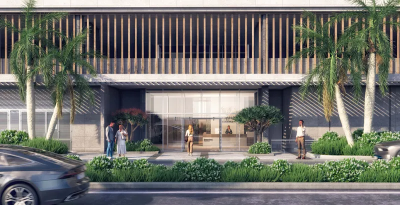 Glass-fronted entrance lobby of the Verdana VII apartment building with gardens (developer render)