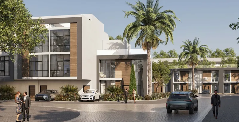 Verdana VII townhouses with palm trees and a landscaped turning circle (developer render)