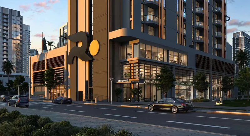 Ground-floor retail frontage and entrance of Verso at dusk (developer render)