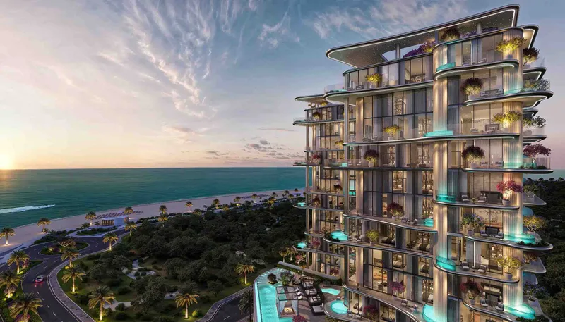 Curved balconies of Villa del Gavi above the coast road and beach of Dubai Islands