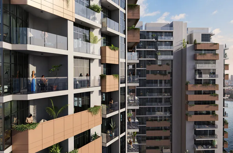 Vista 3 tower facade with glass balconies and planted copper-toned panels (developer render)