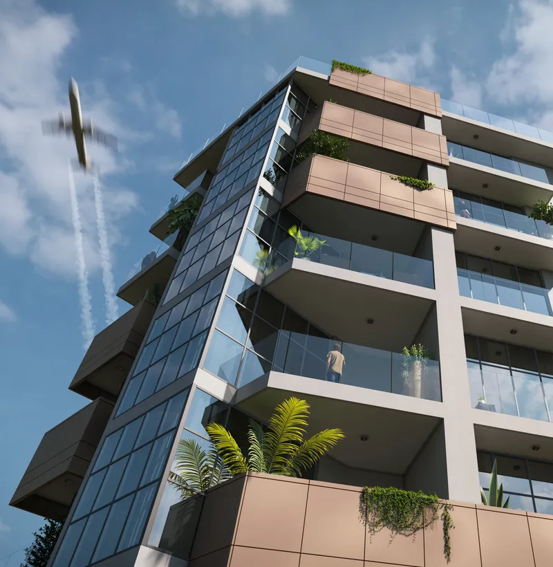 Low-angle view of the Vista 3 facade with balconies and planters against a blue sky (developer render)