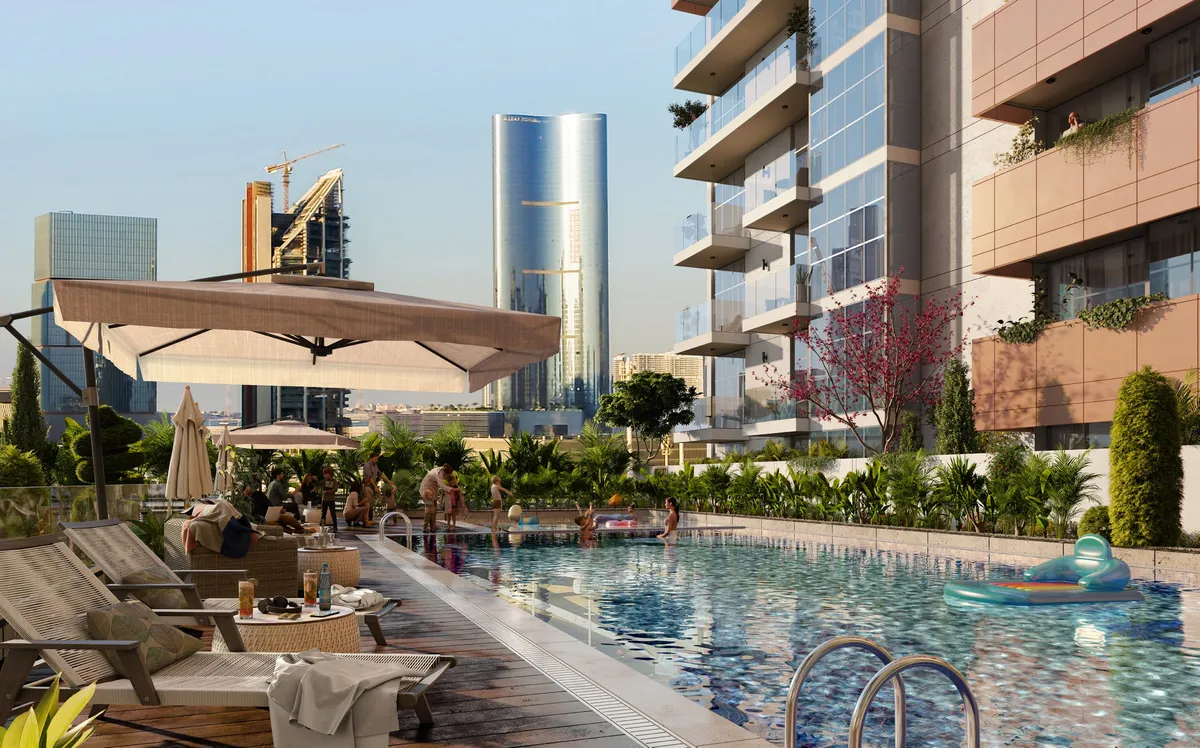 Podium swimming pool with sun loungers and parasols beside the Vista 3 tower on Al Reem Island, Abu Dhabi (developer render)