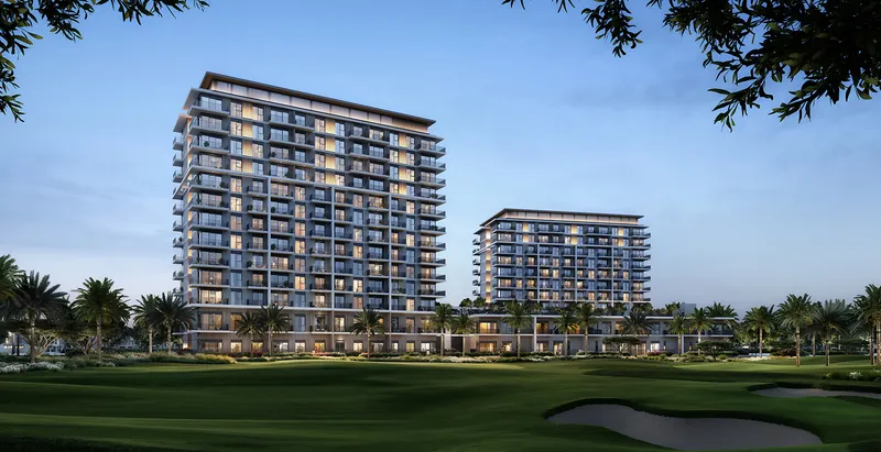 Render of the two Vista Ridge buildings seen across the Emaar South golf course at dusk