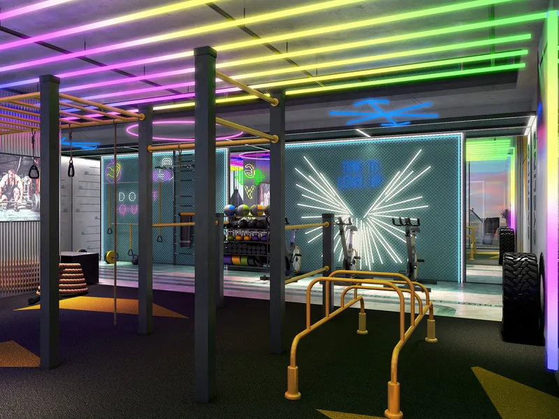Gym at Volta with training rigs and coloured lighting