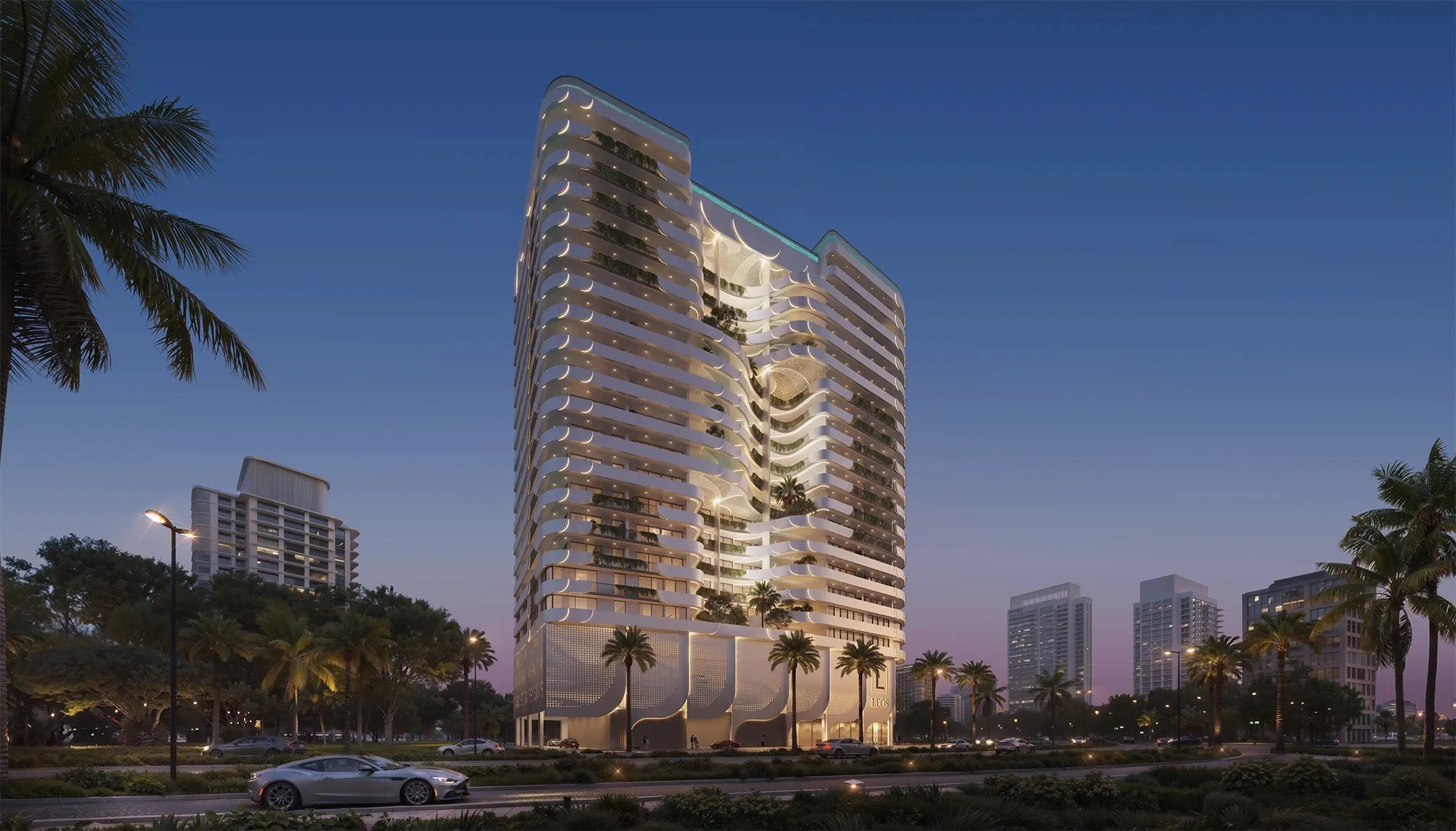 Dusk render of Weybridge Gardens 4 in Dubailand, a white residential tower with curved balconies and planting