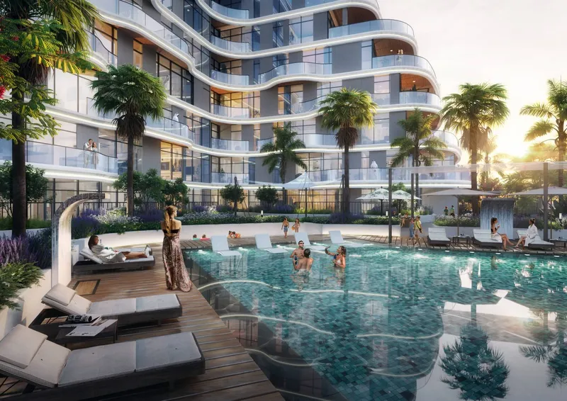 Swimming pool and sun loungers in the courtyard of Zephyra Residences