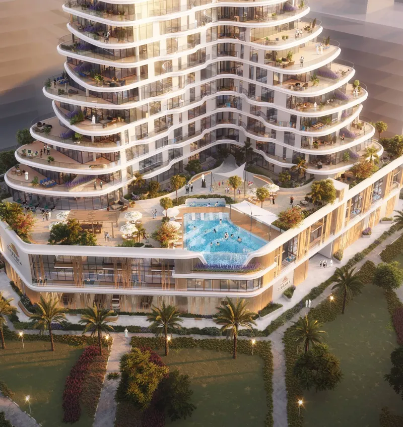 Aerial view of Zephyra Residences with cascading planted terraces around a central pool